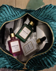 VIBRANT® skincare serum collection in a luxury makeup bag — microbiome-friendly serums by Vibrant Skin