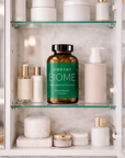 Bottle of 'Vibrant Biome' on a shelf with skincare products
