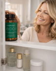 Woman holding a bottle of 'Vibrant Libido-F' supplements in a bathroom setting.
