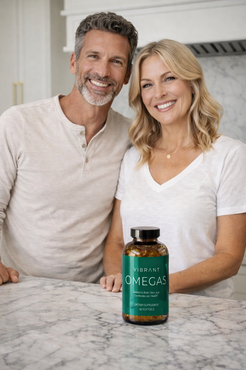 Man and woman standing behind a bottle of Ombrant Omegas on a kitchen counter.