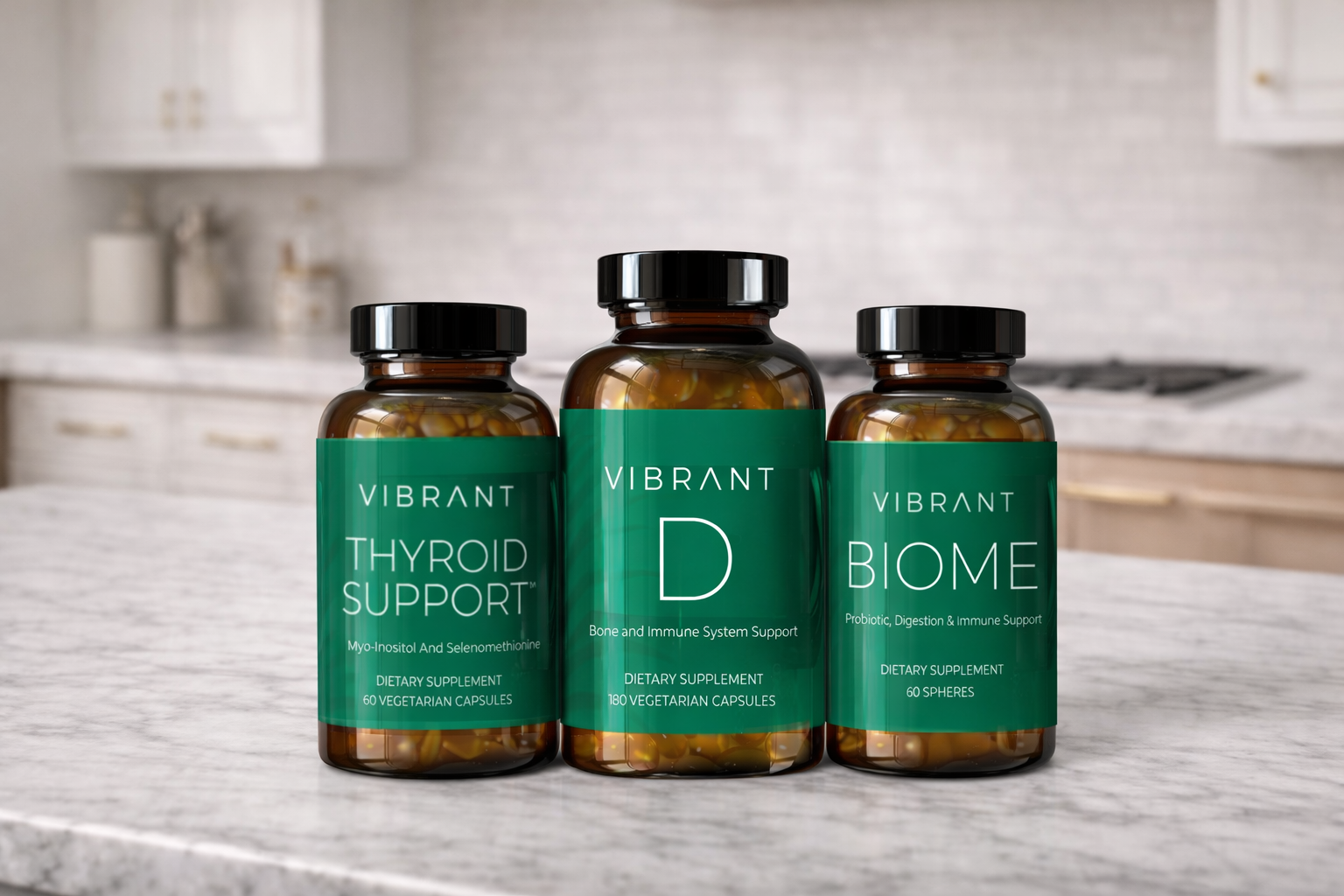 Three bottles of Vibrant Health supplements on a kitchen counter.