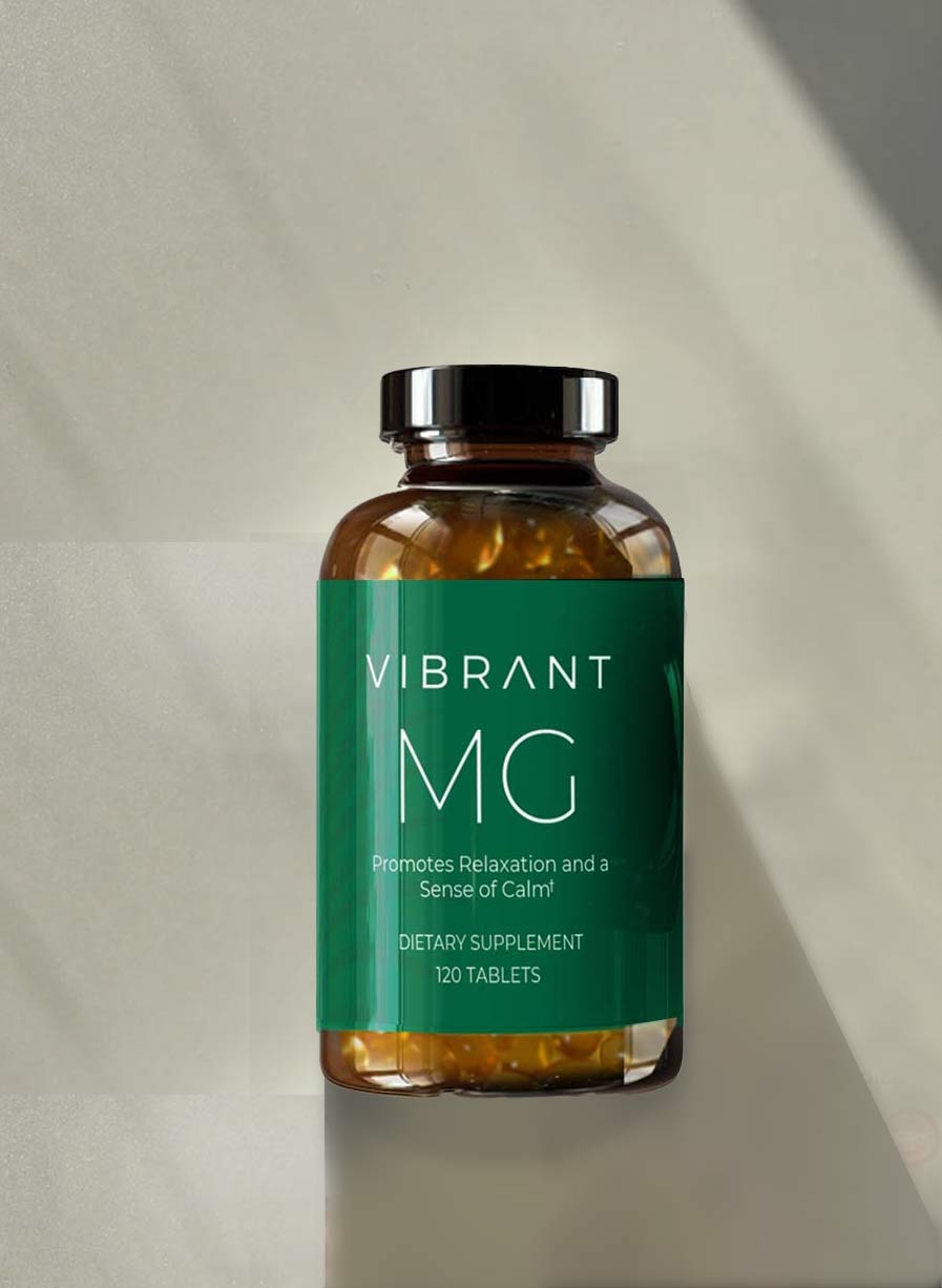 Vibrant MG dietary supplement bottle on a neutral background